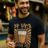 A model is wearing a Bengali Navy Blue unisex t-shirt that celebrates the tea culture of Kolkata