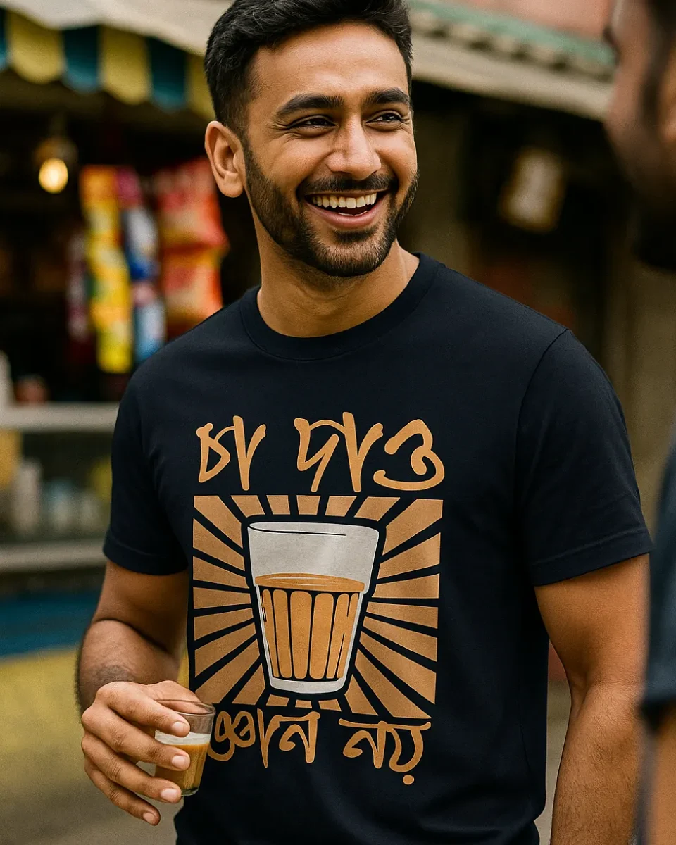 A model is wearing a Bengali Navy Blue unisex t-shirt that celebrates the tea culture of Kolkata