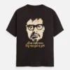 A unisex Bengali printed t-shirt in Coffee Brown color that shows a famous dialogue from legendary filmmaker Ritwik Ghatak